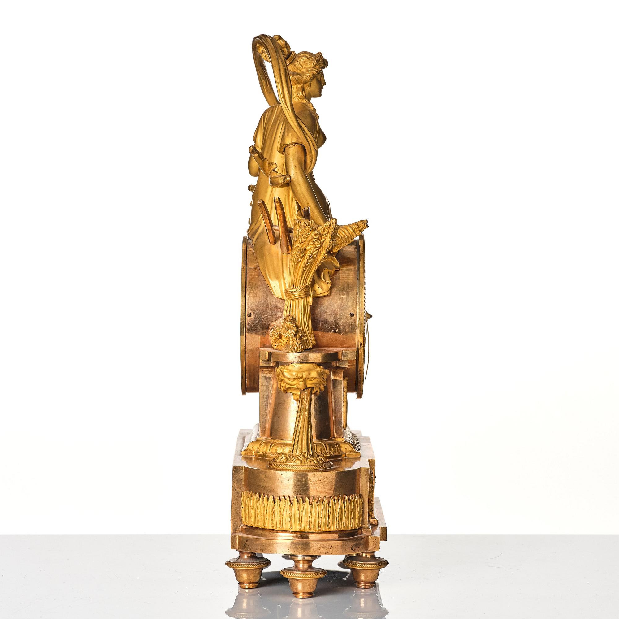 A French Empire mantle clock, early 19th century.