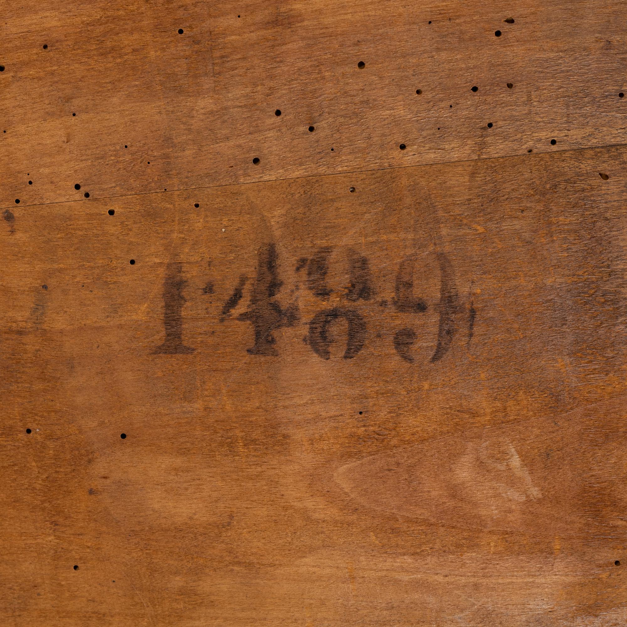A mahogany veneered table, circa 1800.