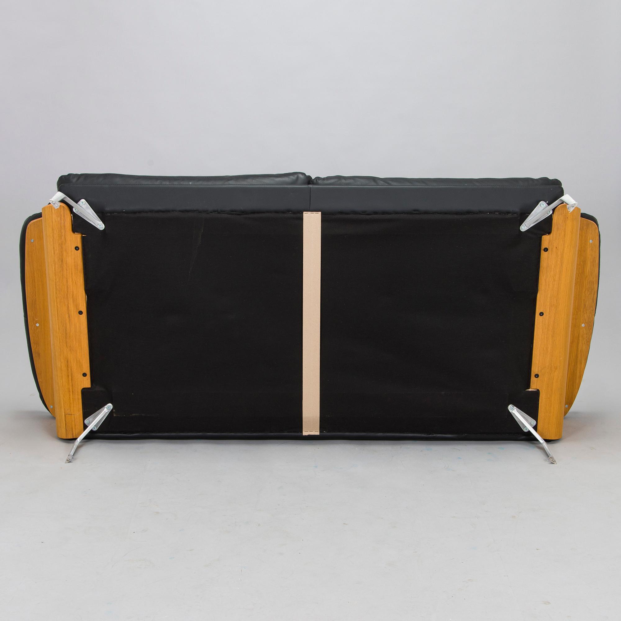 A leather sofa, Hjort Knudsen, Denmark, 21st Century.