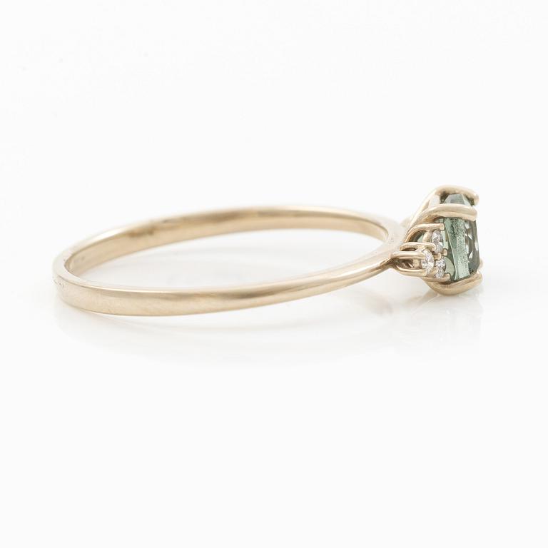 Ring in 14K white gold with tourmaline and brilliant-cut diamonds.