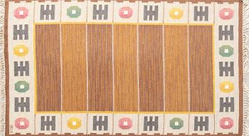Anna-Greta Sjöqvist, a signed flat weave carpet approx 247x176 cm.