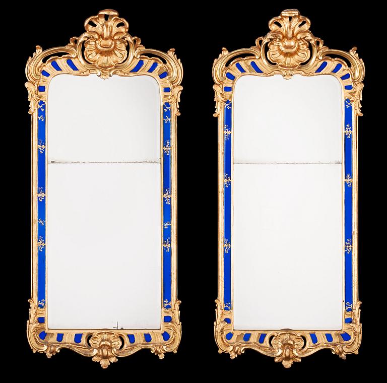 A pair of Swedish Rococo mirrors by E. Göbel dated 1760.