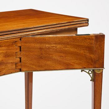 A late Gustavian mahogany games table, presumably by A. Nordström (Journeyman at G. Iwersson 1806-09).