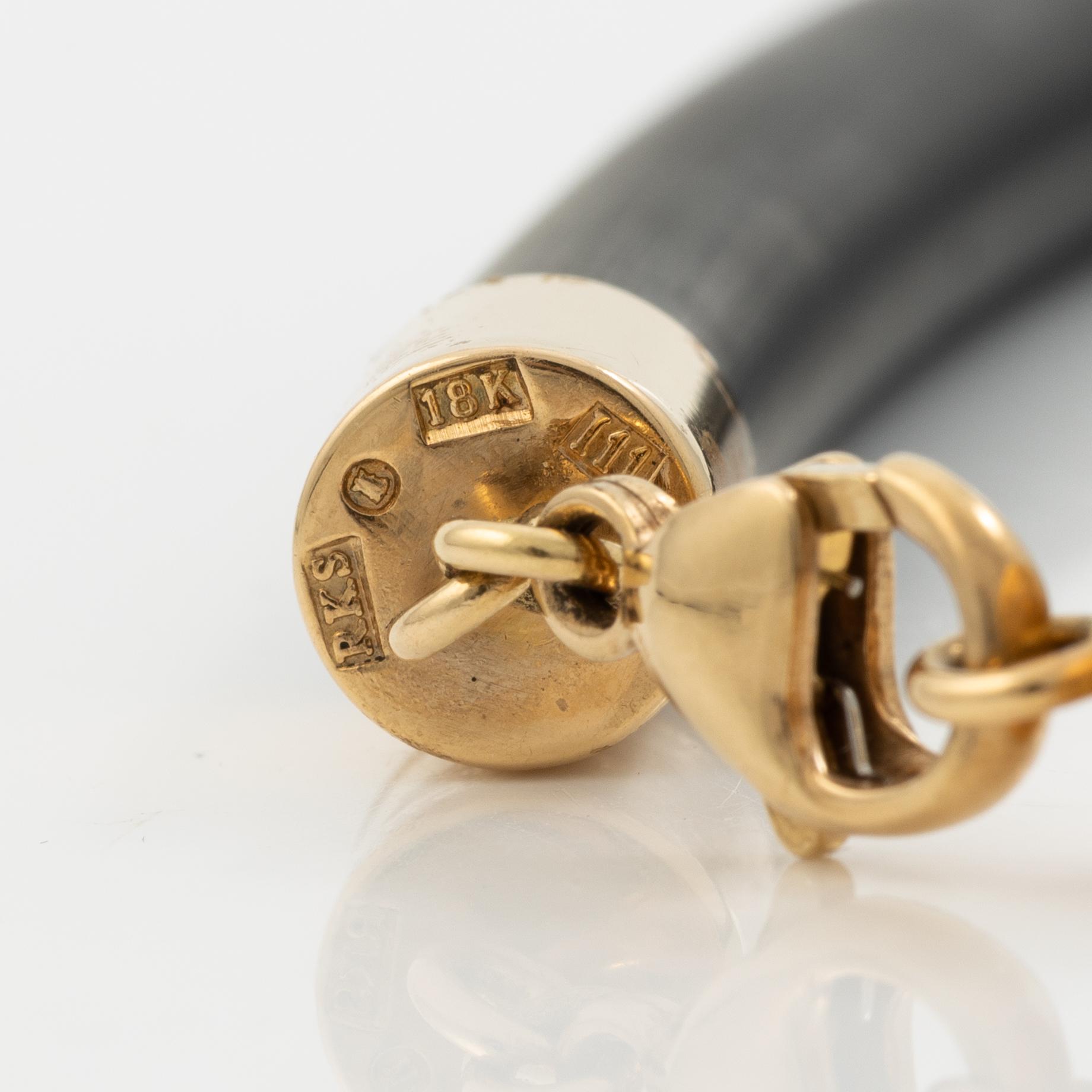 Necklace 18K gold with a cultured freshwater pearl and rubber, Rolf Karlsson Stockholm 2007.