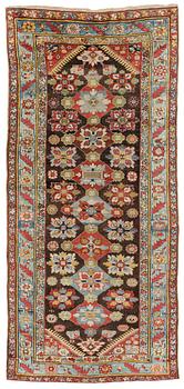 354. An antique Karabagh carpet,  ca 330 x 157 cm (one end with 1-3 cm flat weave).