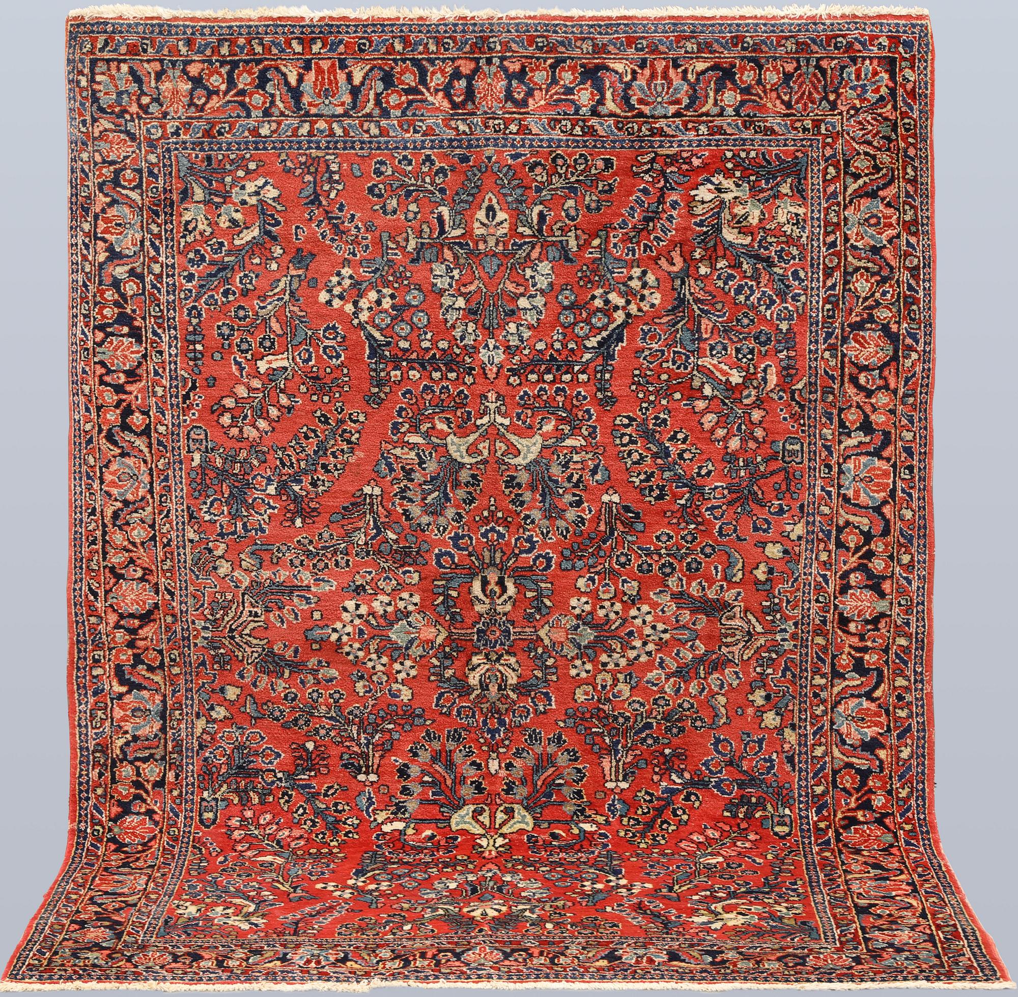 An American Sarouk rug, semi-antique, c. 200 x 142 cm.