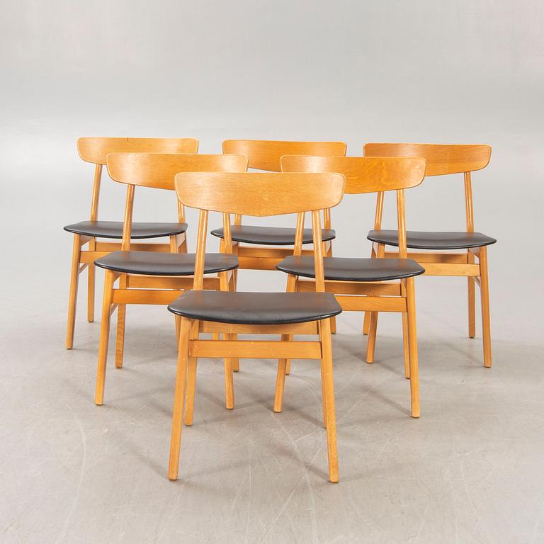 A set of six Danish beech chairs later part of the 20th century.