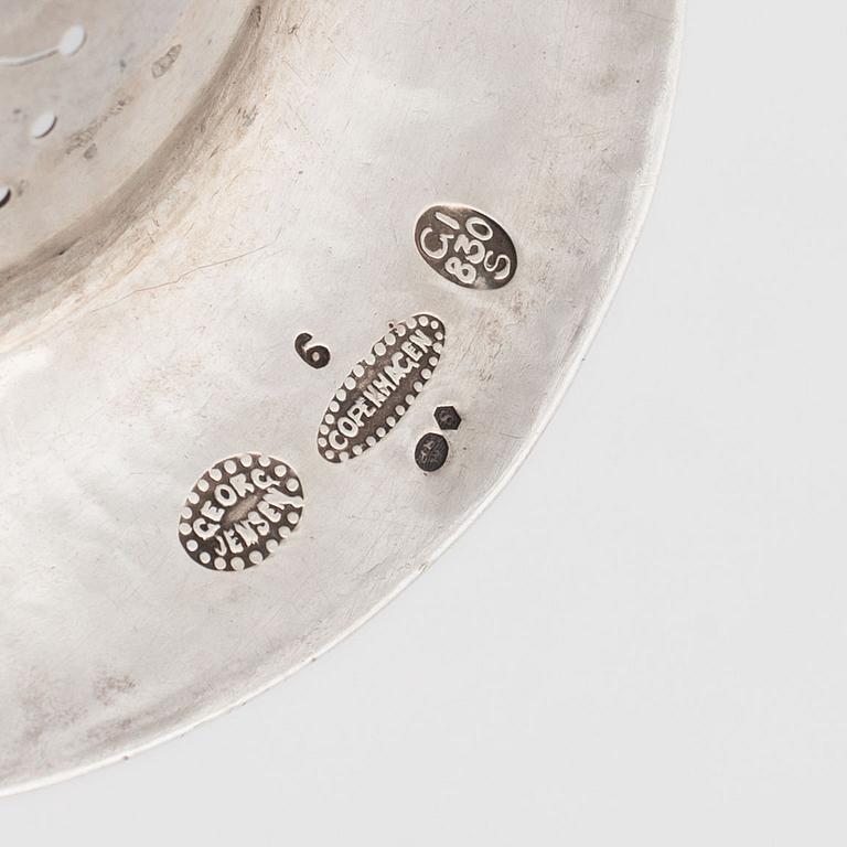 Georg Jensen, silver tea strainer, Copenhagen, Denmark.