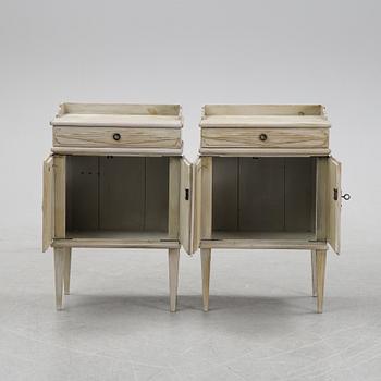 A pair of Gustavian style bedside tables, first half of the 20th century,.