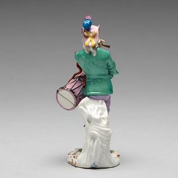 A Meissen figure of a musician, 18th Century.