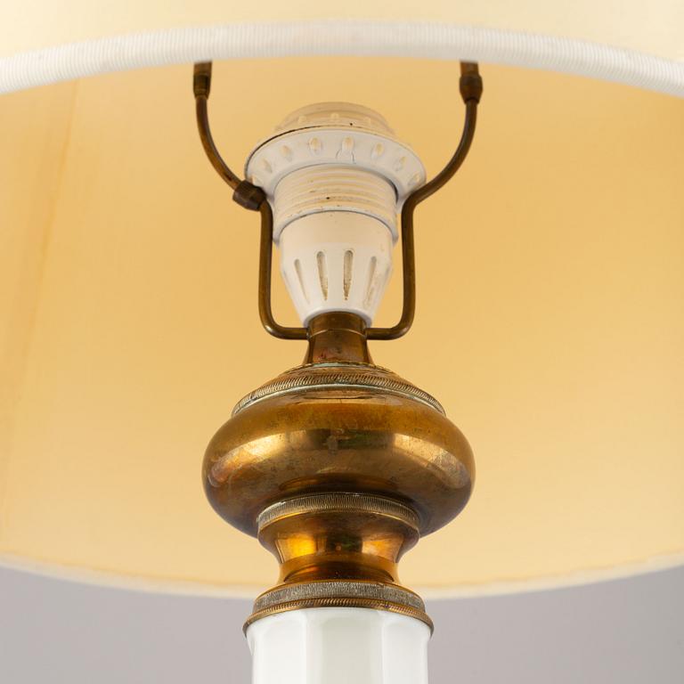 A glass and brass table lamp, mid/second half of the 20th century.