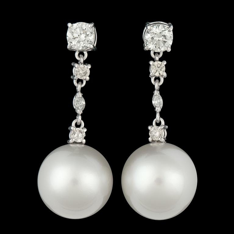 A pair of cultured South sea pearl, app. 15,5 mm, and brilliant cut diamonds, tot. 2.10 cts.