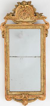 A Gustavian mirror by Carl Gustaf Fyrwald, active in Stockholm 1750-1825.