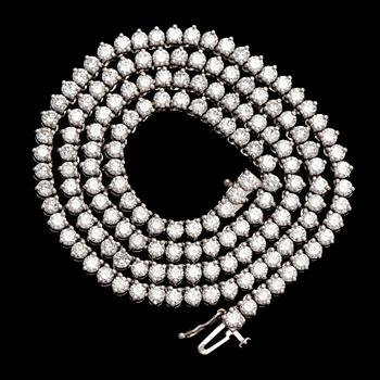 Kaulakoru, 18K valkokultaa ja briljanttihiottuja timantteja.