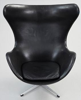 An Arne Jacobsen black leather 'Egg Chair', Fritz Hansen, Denmark 1964.