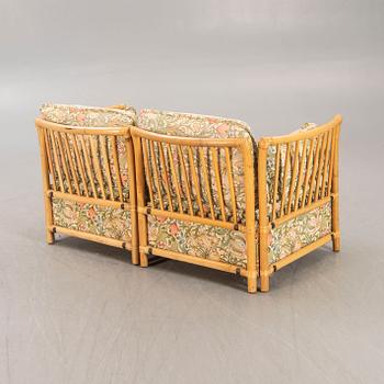 A bamboo and rattan sofa later  part of the 20th century.