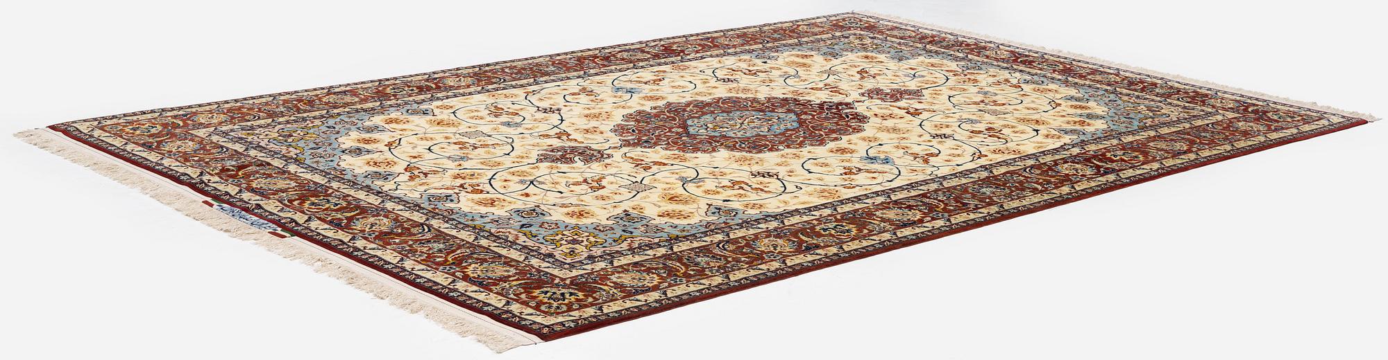 An Isfahan carpet, Central Persia, signed Akbaroff, c. 315 x 205 cm.