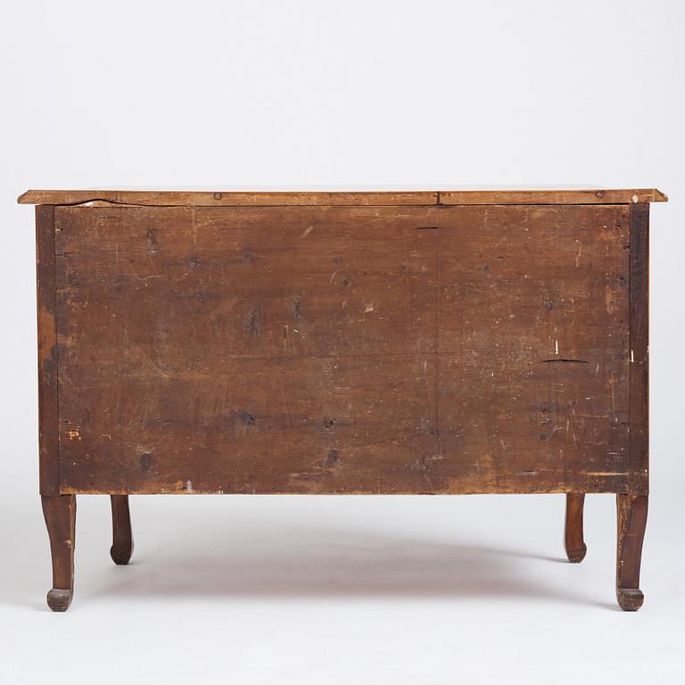 A late Baroque walnut-veneered chest of drawers attributed to J. H. Fürloh (master in Stockholm 1724-1745).