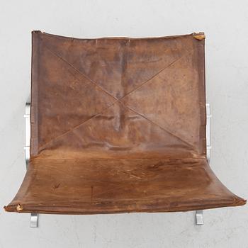 Poul Kjaerholm, a pair of brown leather "PK-22" chairs, edition E Kold Christensen.