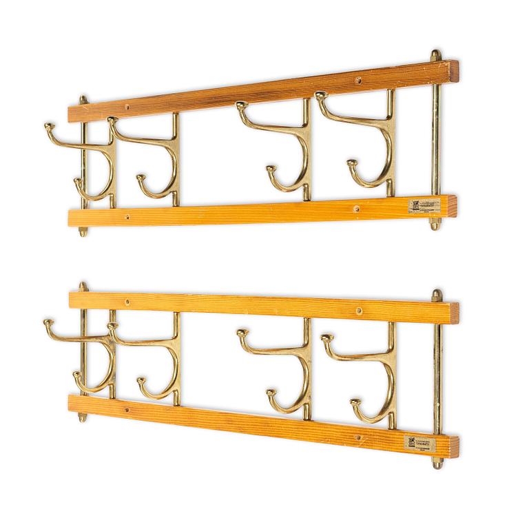 Klädhängare, ett par, "Dekorativ", Skoglunds metallgjuteri, Anderstorp, 1950/60-tal.