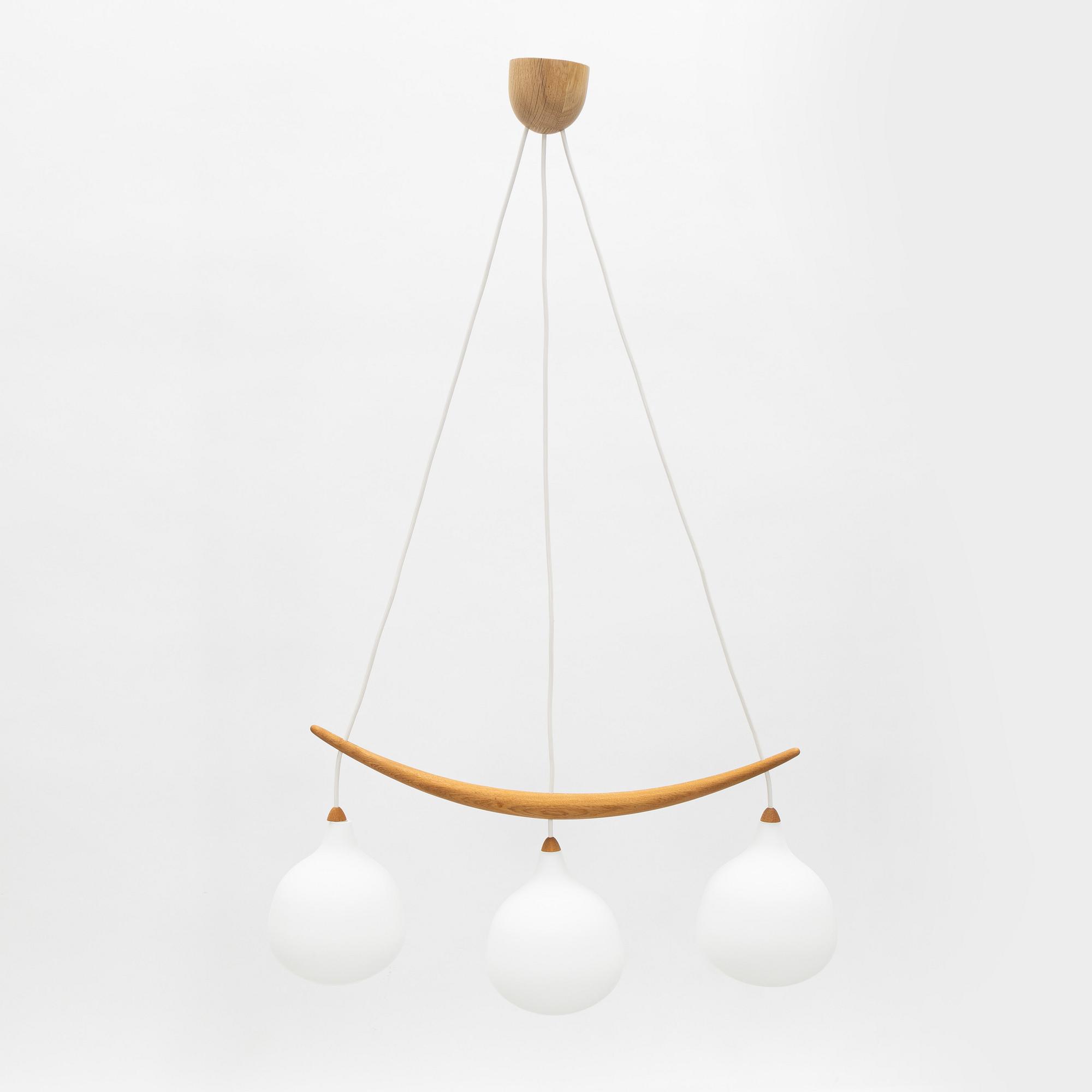 Uno & Östen Kristiansson, a 'Bananen' oak and glass three-light ceiling lamp, Luxus, Vittsjö.