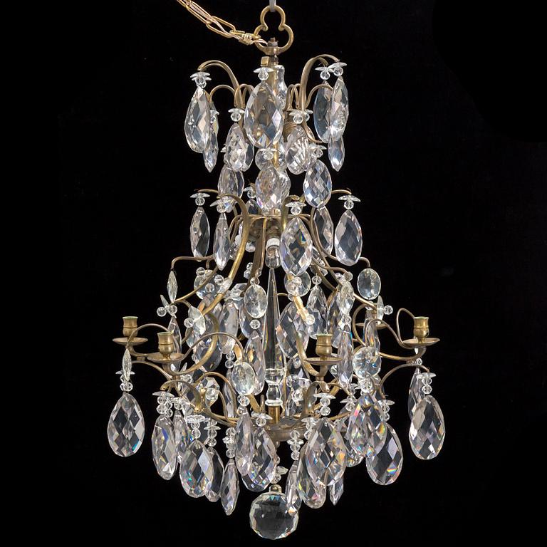 An early 20th century chandelier with glass prisms.