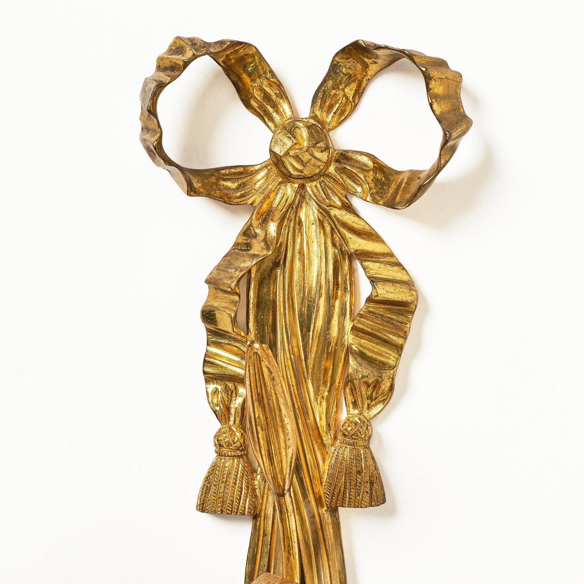 A pair of gilt bronze two-branch appliques after F. L. Rung, late 19th century,