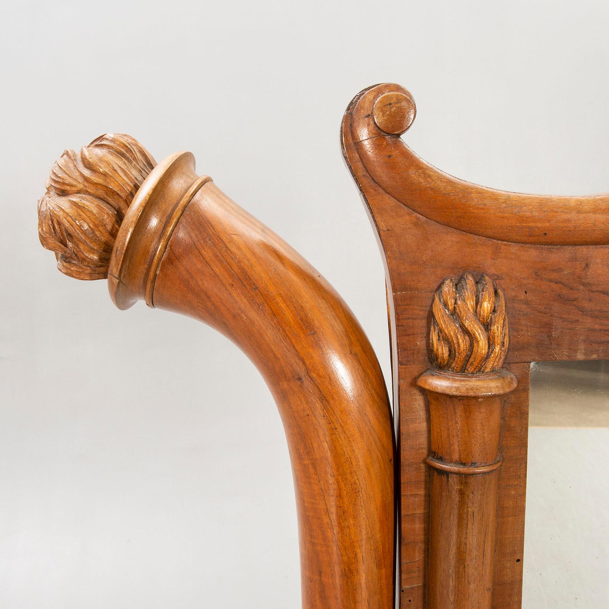 A late 19th century walnut floor mirror.