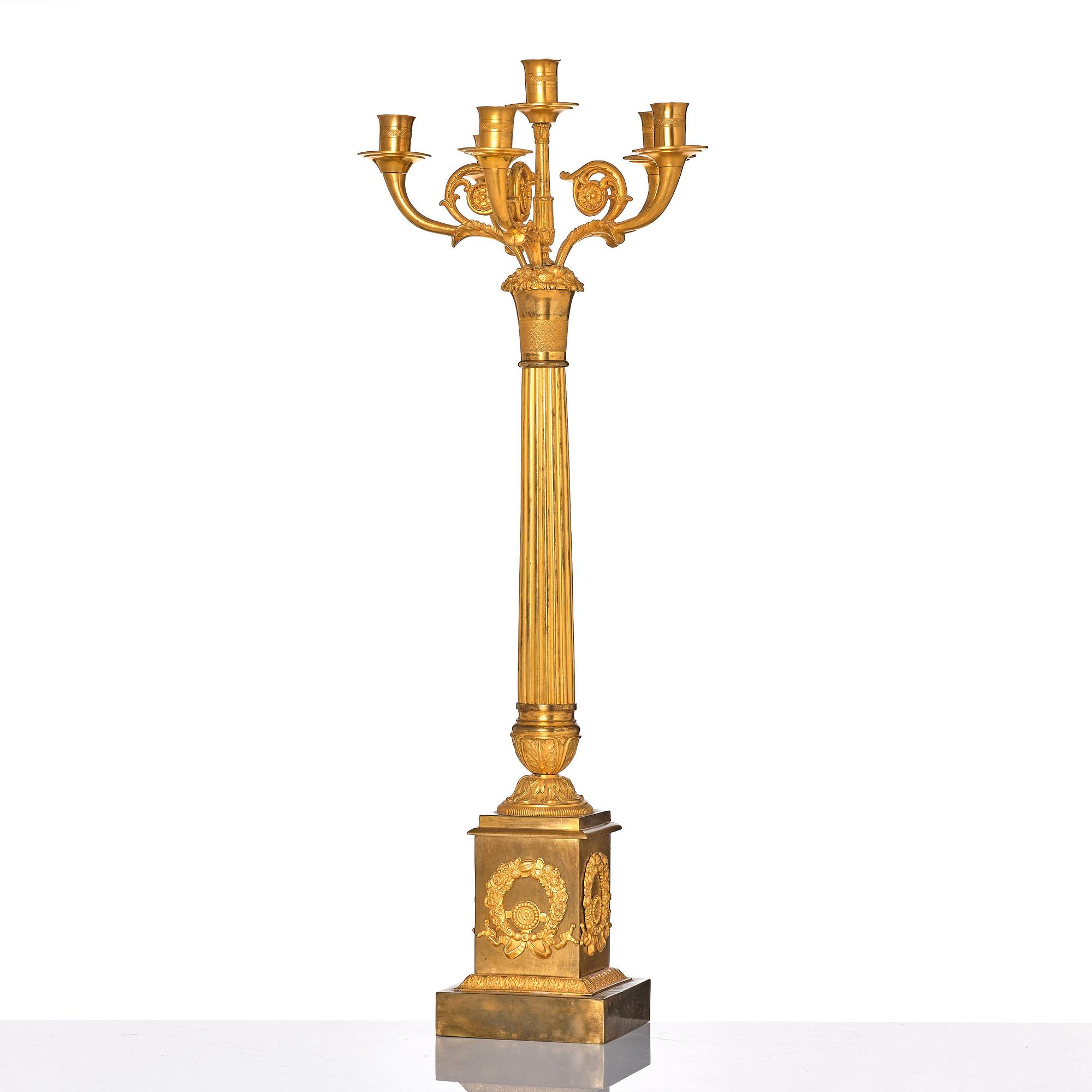 A French late Empire gilded six-light candelabra, mid 19th century.