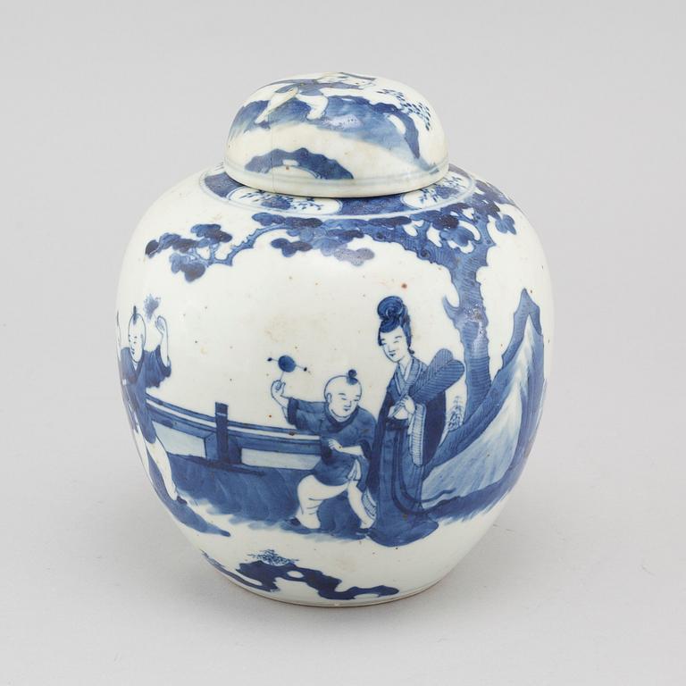 A blue and white vase with lid in Kangxi style, around year 1900.