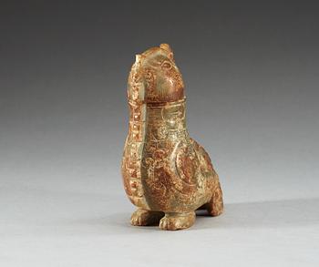 An archaistic nephrite bird shaped covered vessel.