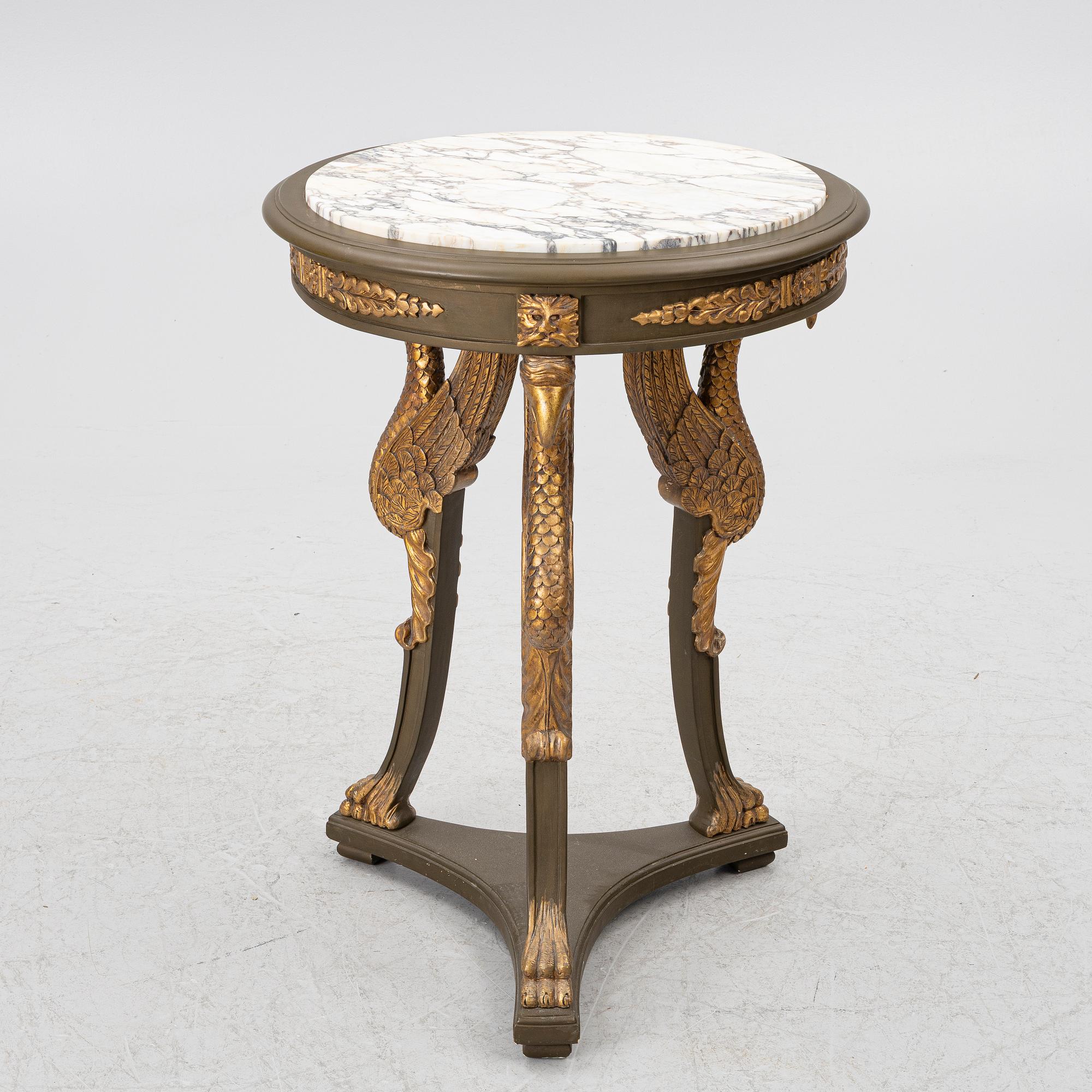 A pair of Empire-style armchairs with an end table, second half of the 20th century.