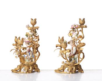 A pair of Meissen Rococo-style three-light candelabra, second half of the 1800's.