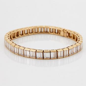 Van Cleef et Arpels armband 18K guld med baguetteslipade diamanter "Bracelet Baguette".