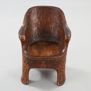 A Gustaf Fjaestad Art Nouveau carved pine chair 'Stabbestol', by Adolf Swanson, Arvika, Sweden 1908.
