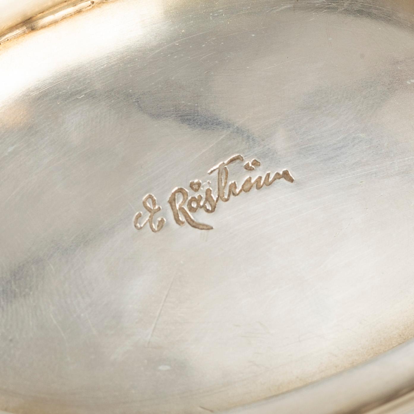 Eric Råström, lockskål, silver, Stockholm 1917, samt sked, J E Skreij, Falun 1927.