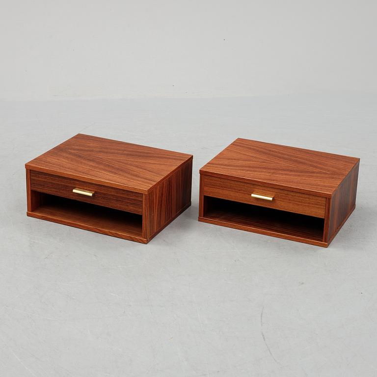 A pair of rosewood veneered coffee tables, 1960's/70's.