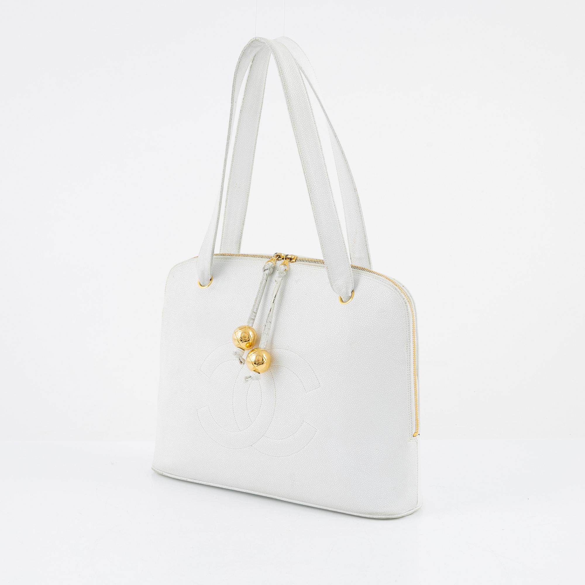 Chanel, a white caviar vintage bag.