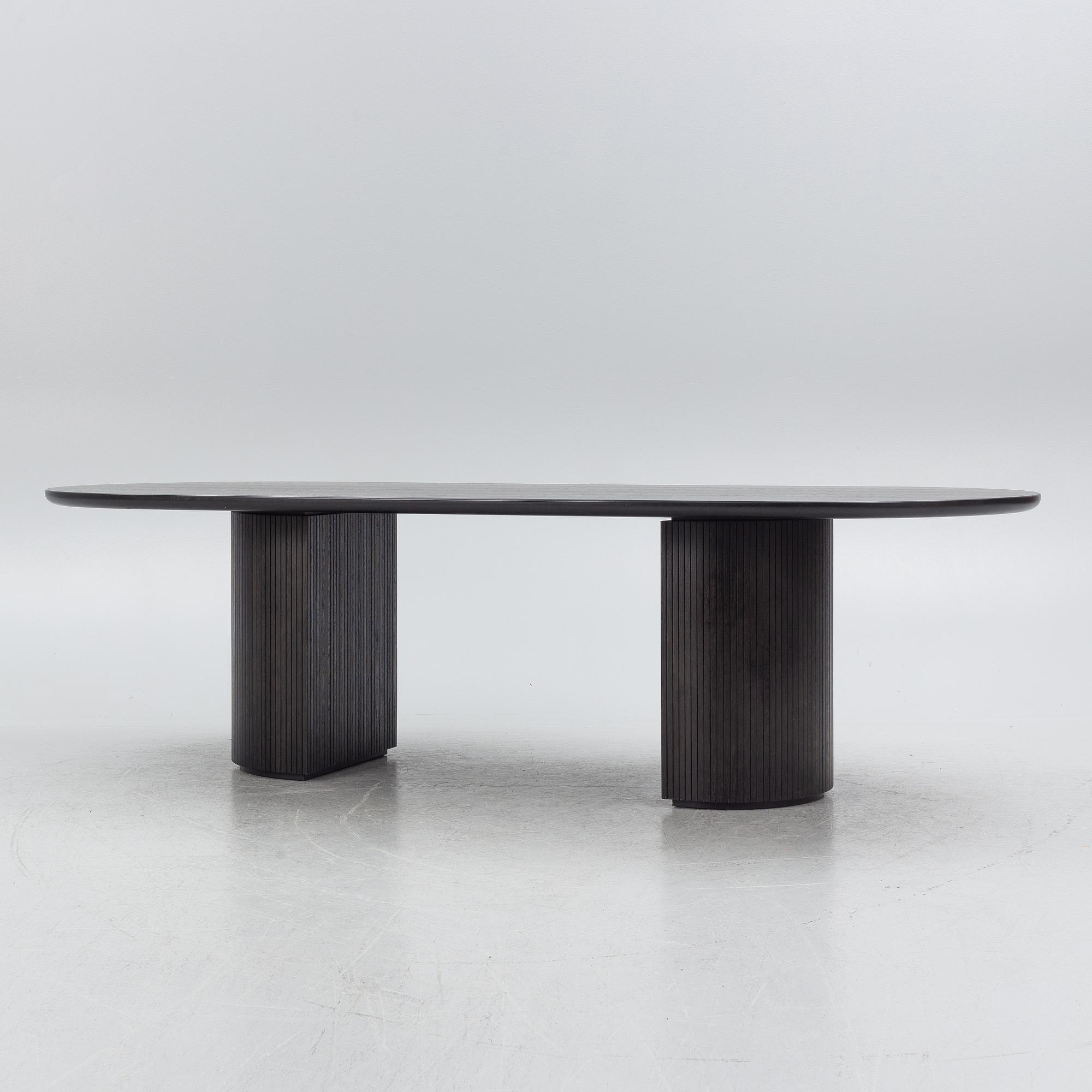 Space Copenhagen, a 'Moon' dining table, Gubi, Denmark.