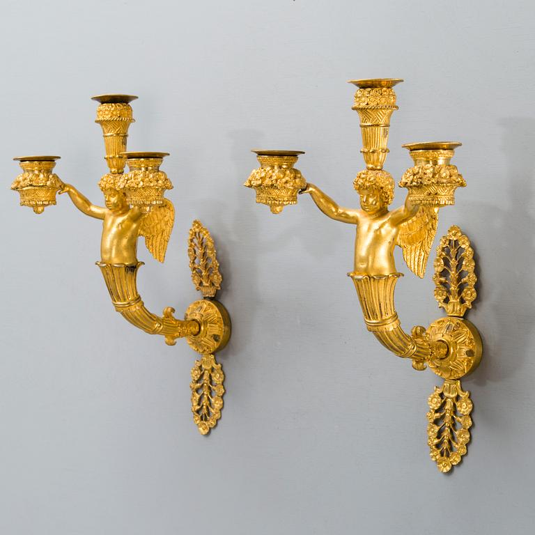 A PAIR OF WALL CANDELABRAS, France, empire first half of the 19th century, ormolu.