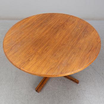 A walnut vereered dining table, mid 20th Century.