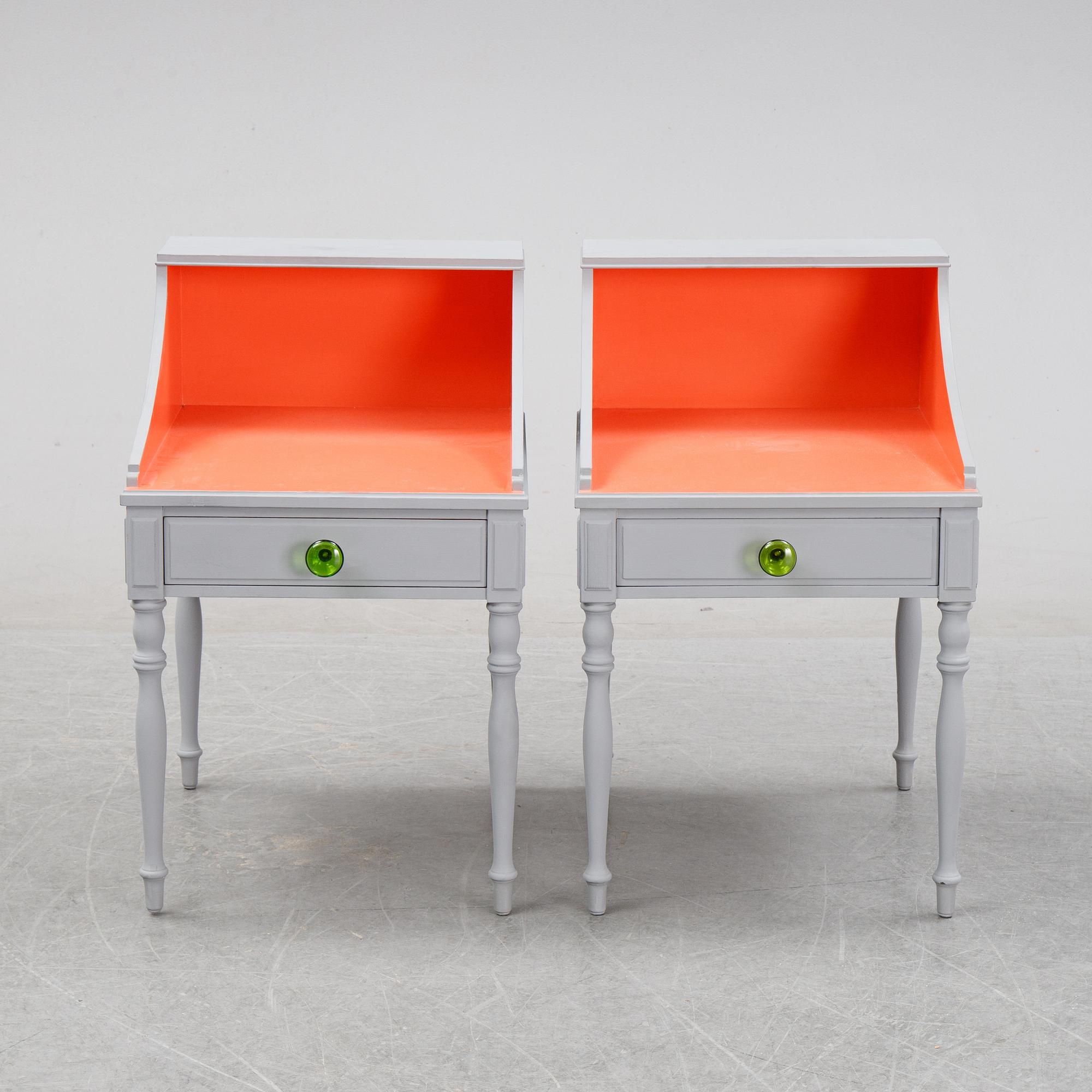 A pair of 20th Century bedside tables.