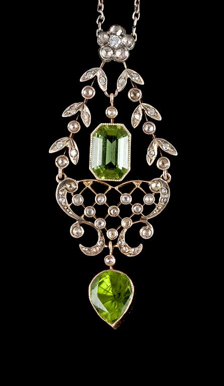 A diamond and peridote pendant.