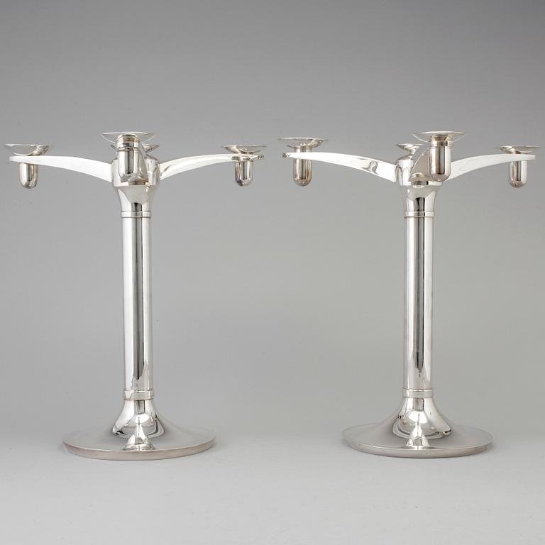 RICHARD FOX, a pair of three armed, four light sterling candelabra, London, 2001 and 2013.