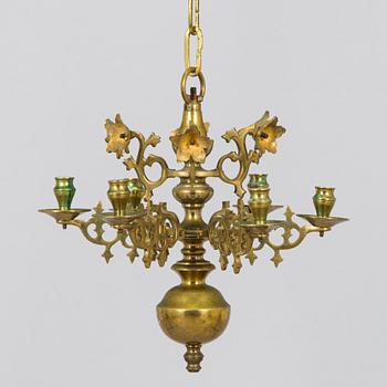 A brass candelabrum, first half of the 20th century.