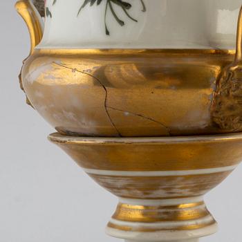 An empire porcelain urn, early 19th century.