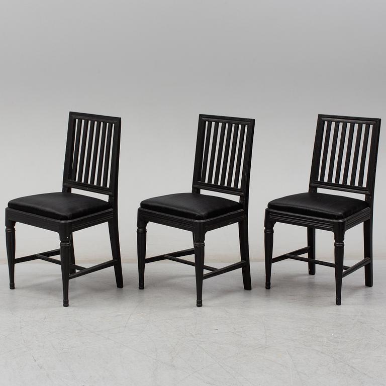 a set of three gustavian chairs.