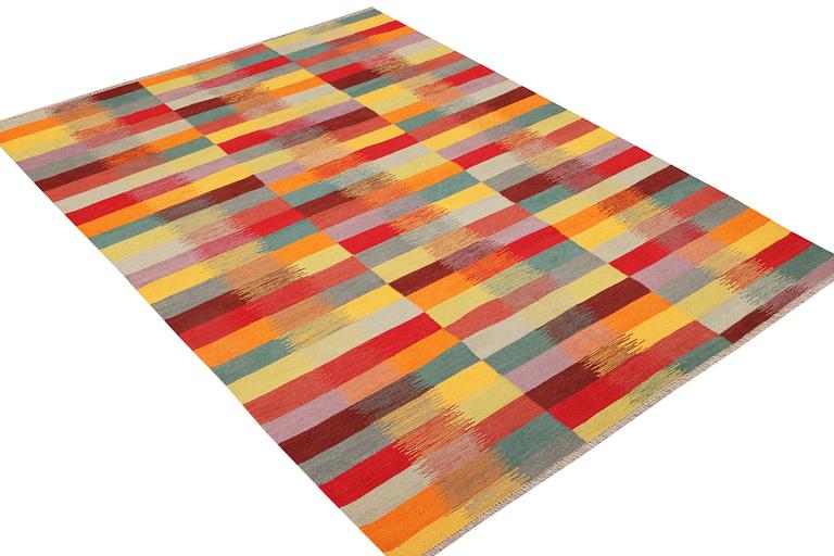 A Kilim rug, c. 232 x 168 cm.