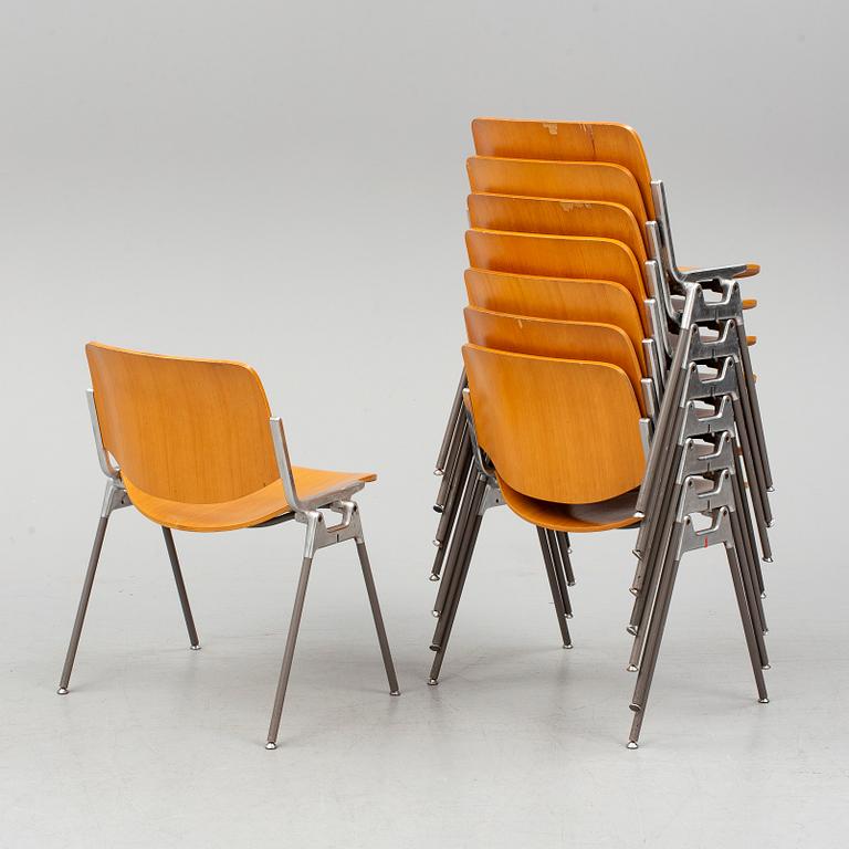 a set of 8 chairs by Giancarlo Piretti for Castelli Italy.