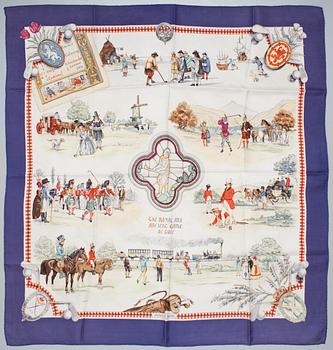 74. A Hermès silk scarf, "The Royal and Ancient Game of Golf".